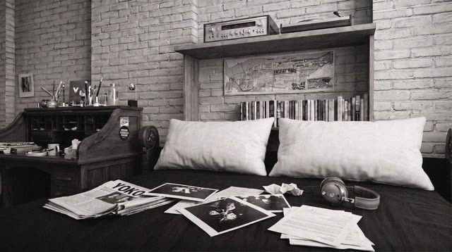 Detail of the bed with headphones, records and ephemera in the 'One to One: John & Yoko' set